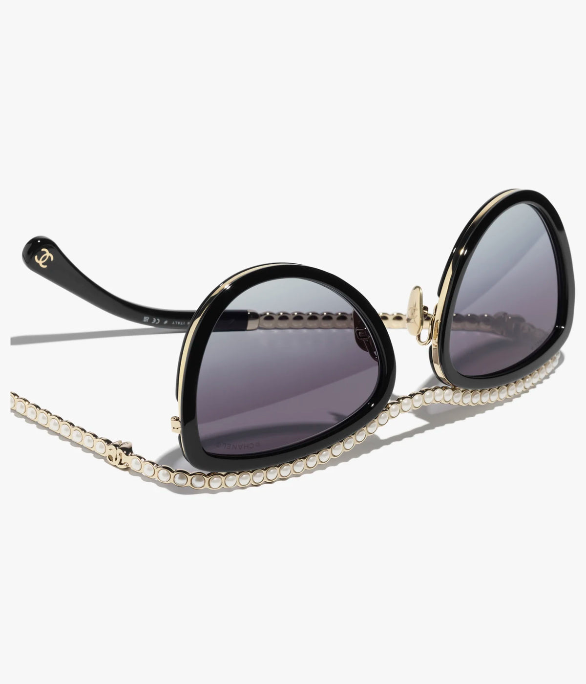 Cat-Eye-Sonnenbrille aus Acetat mit schwarzen und grauen Gläsern sowie Kunstperlen