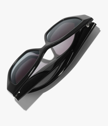 Cat-Eye-Sonnenbrille aus Acetat und schwarzem Perlmutt mit grauen Gläsern