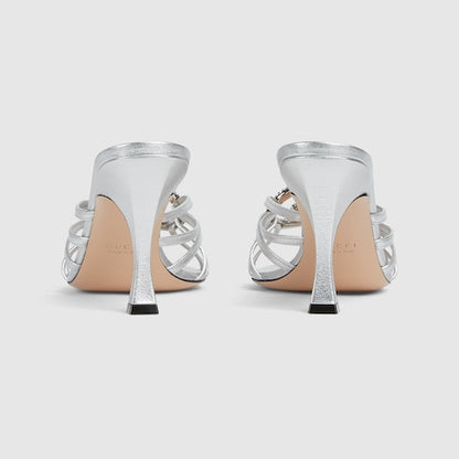 Women's heeled slider sandals with GG criss-cross straps and crystals in silver leather