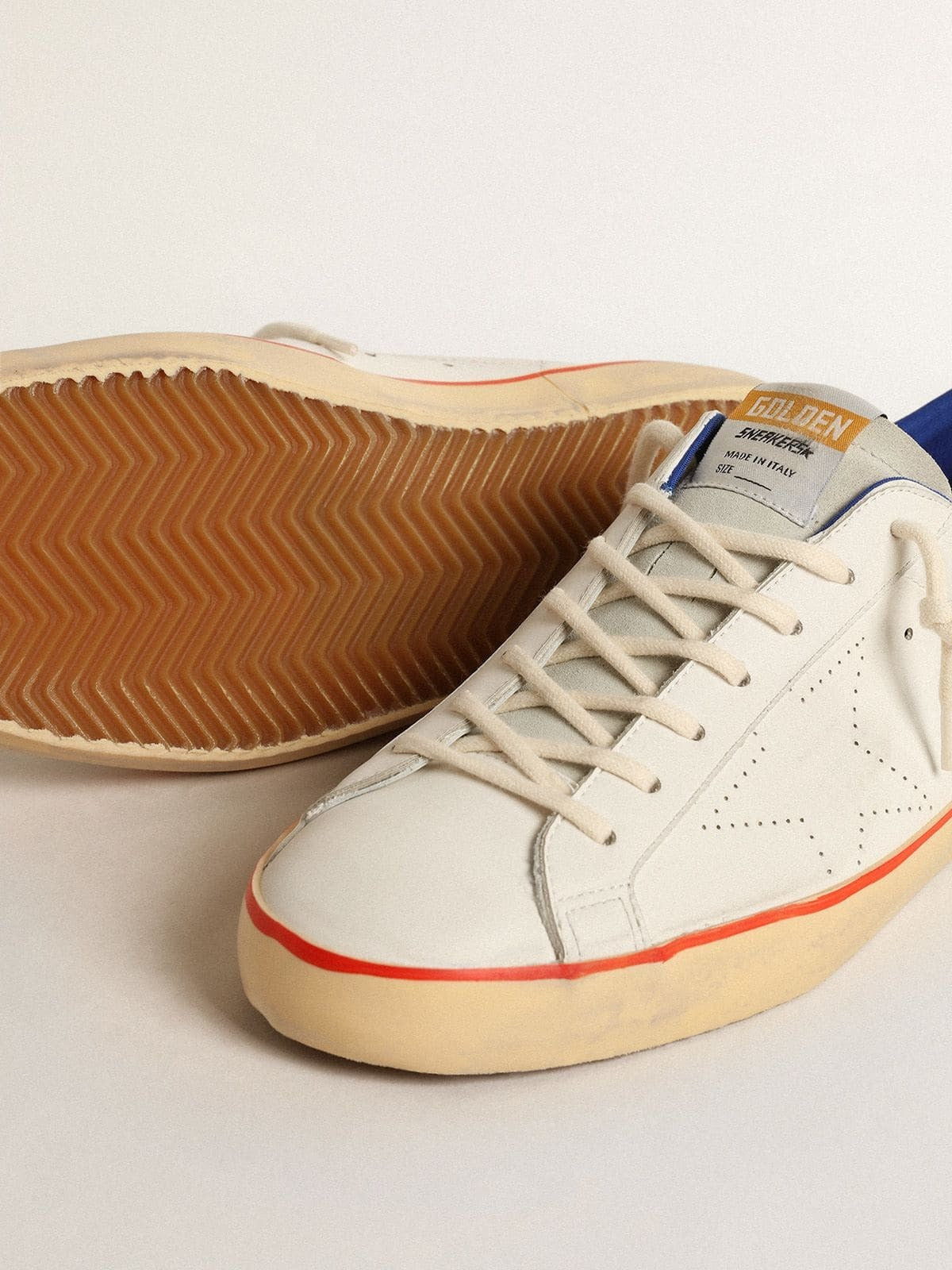Superstar with perforated star and blue suede heel tab