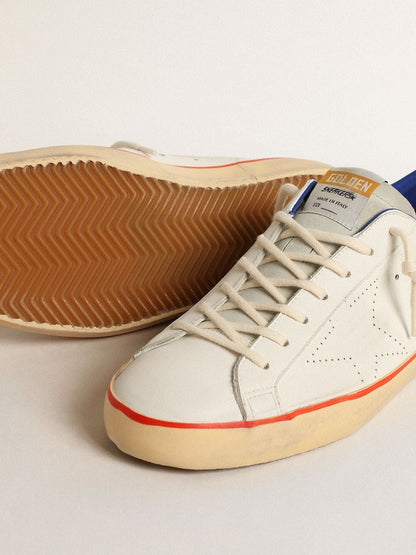 Superstar with perforated star and blue suede heel tab