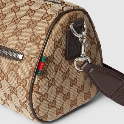 Small cylindrical bag made of GG fabric in beige and dark brown