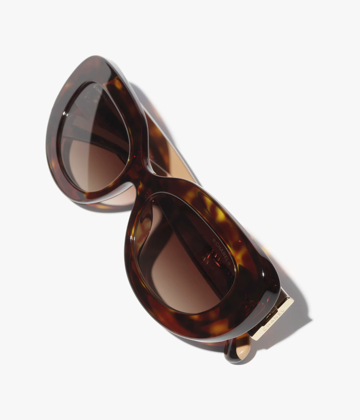 Zweifarbige ovale Sonnenbrille aus dunkelbraunem Havanna-Acetat mit braunen Gläsern