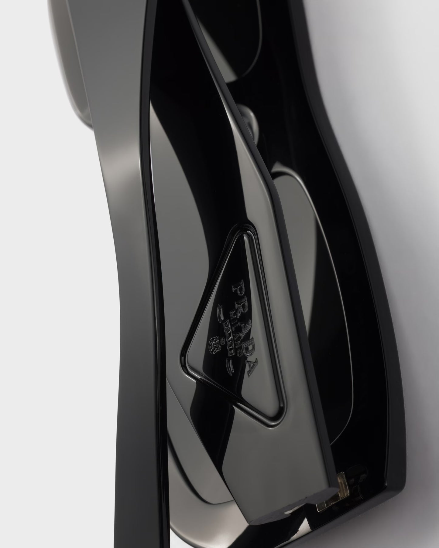 Sunglasses with black triangle logo