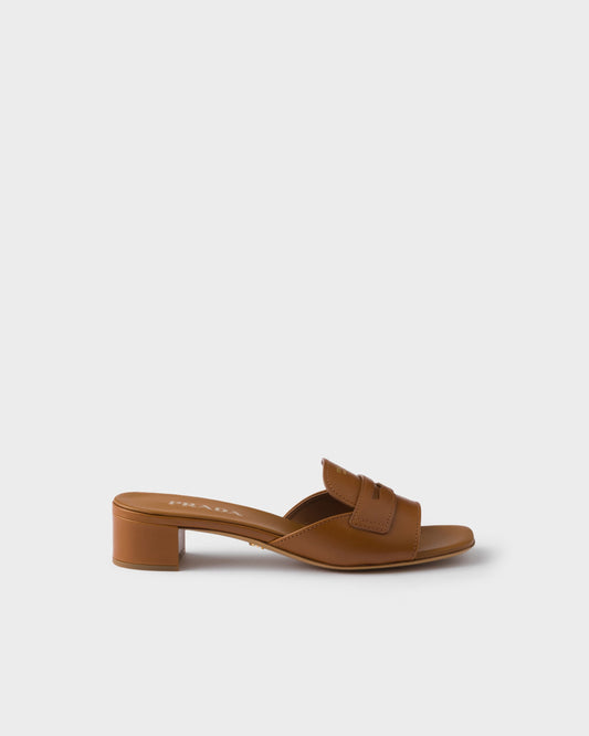 Low-heeled slider sandals in cognac leather