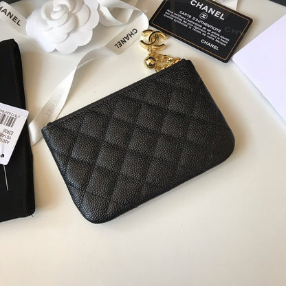 Quilted black leather coin purse with CC logo and gold-tone metal details