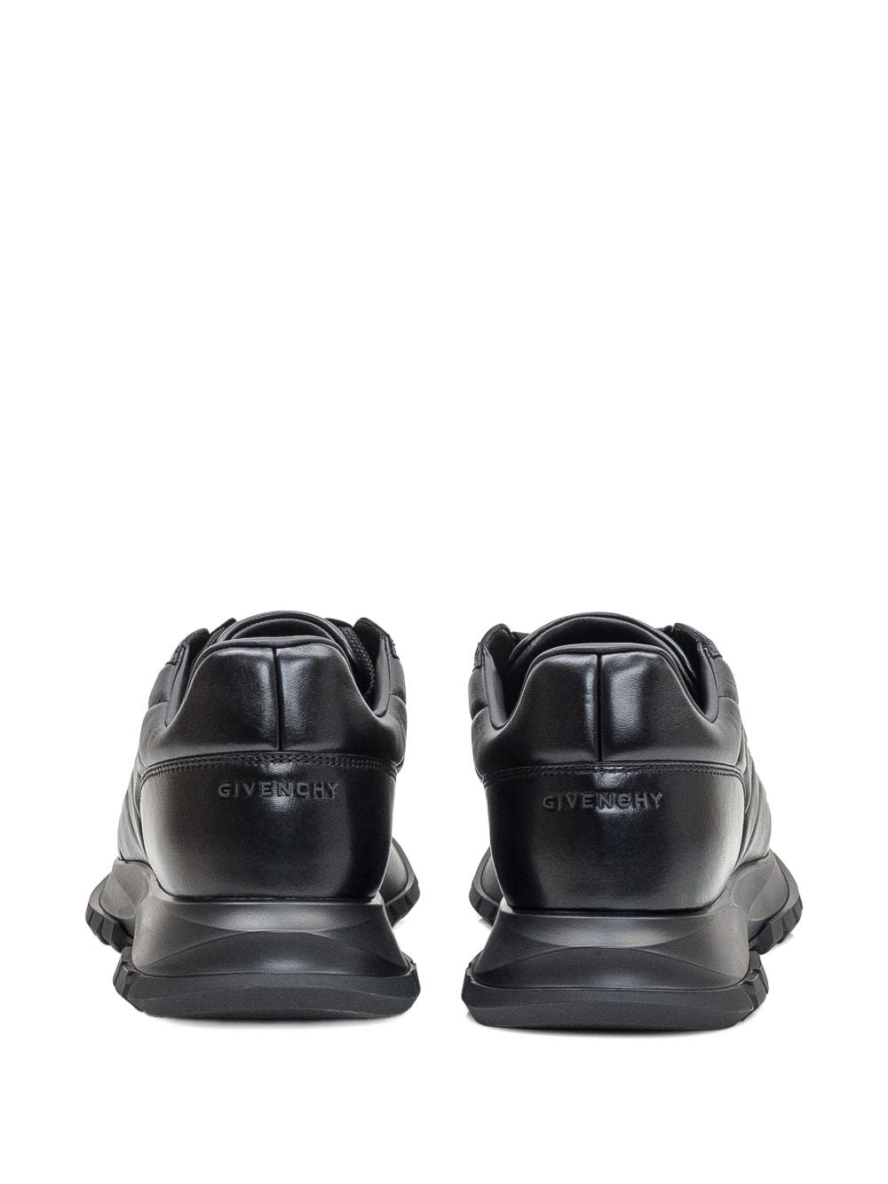 Sneakers aus schwarzem Leder mit Steppmotiv