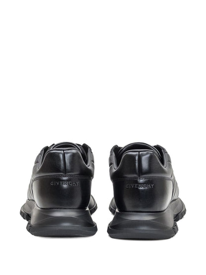 Sneakers aus schwarzem Leder mit Steppmotiv