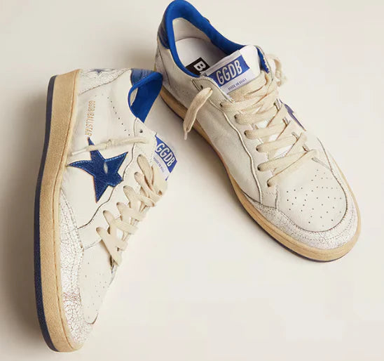White nappa leather with star and cornflower blue heel