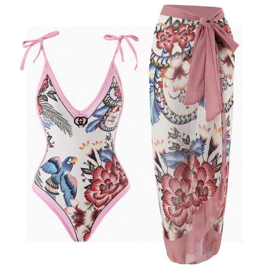Badeanzug und Sarong mit tropischem Blumenprint