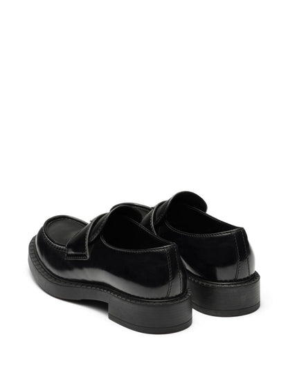 Brushed leather slippers in black