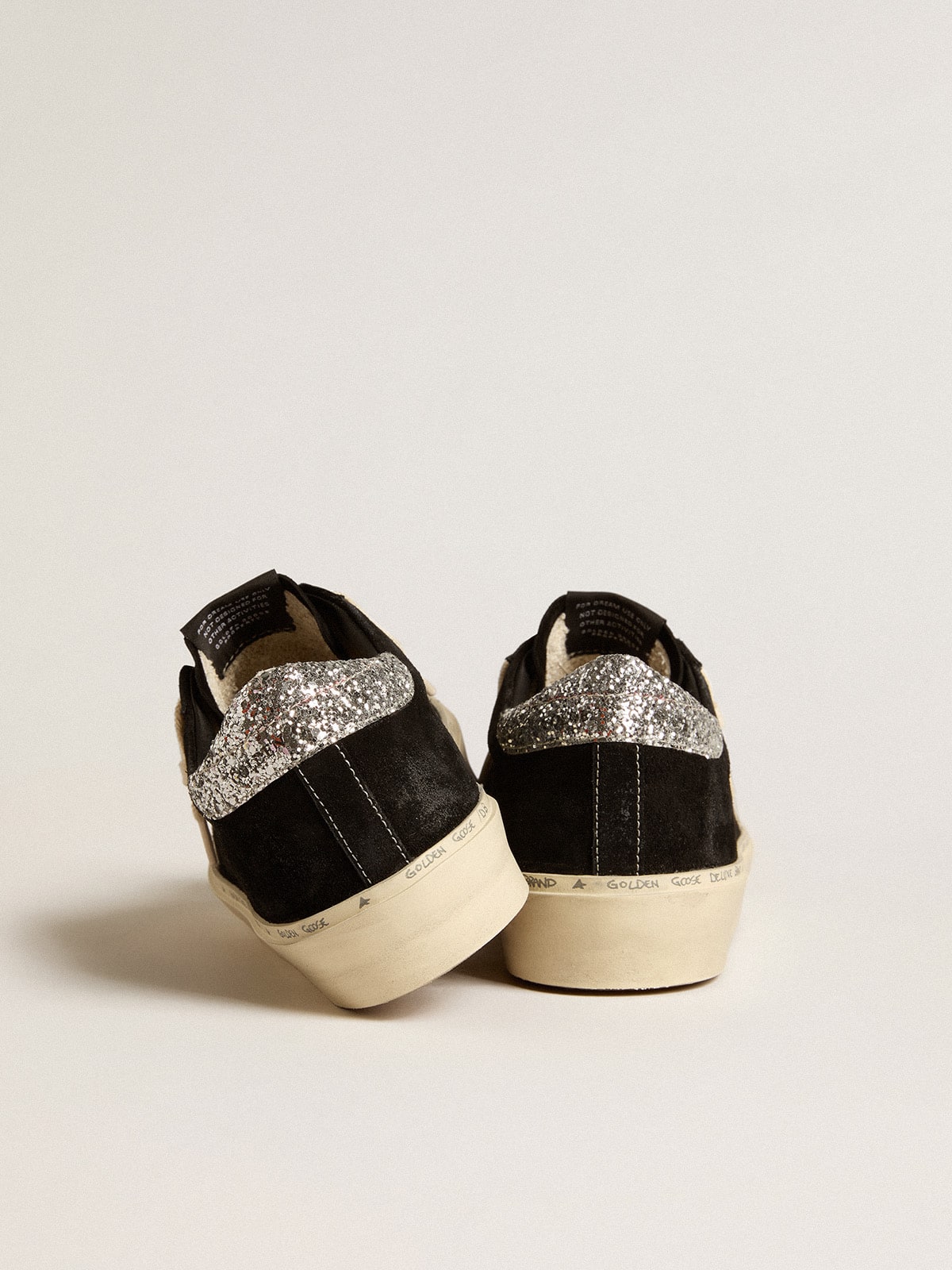 Hi Star shoes in black leather with silver glitter on the heel.