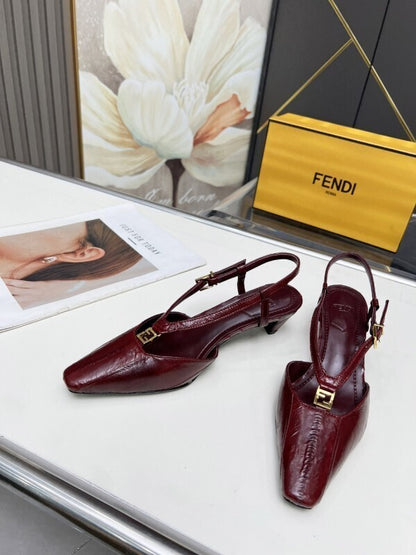 Kitten-heel pumps in Bordeaux leather with FF buckles in gold