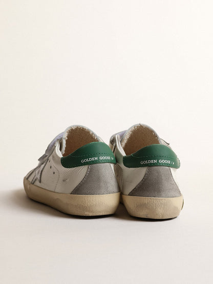 Old School Young with metallic leather star and green heel