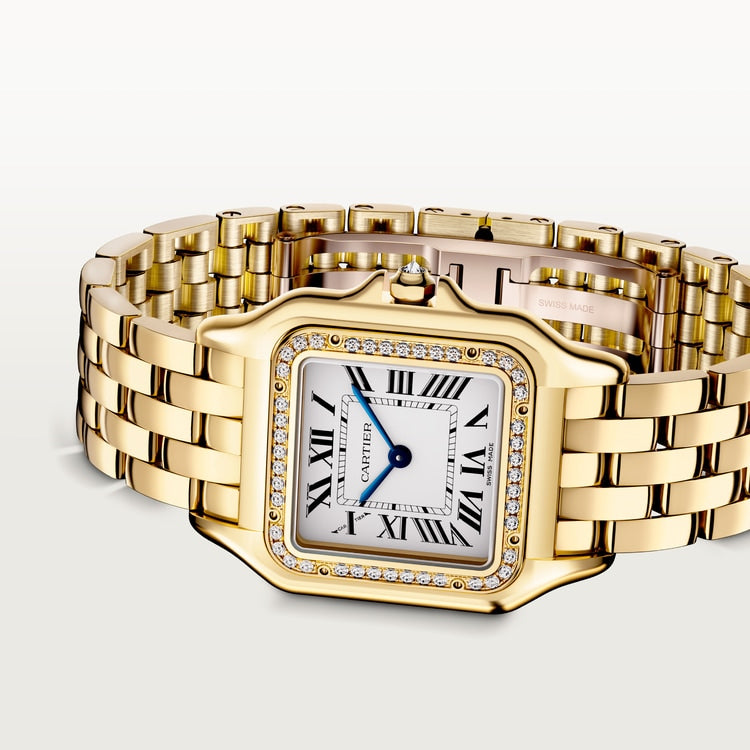 Panther watch with yellow gold case and diamonds