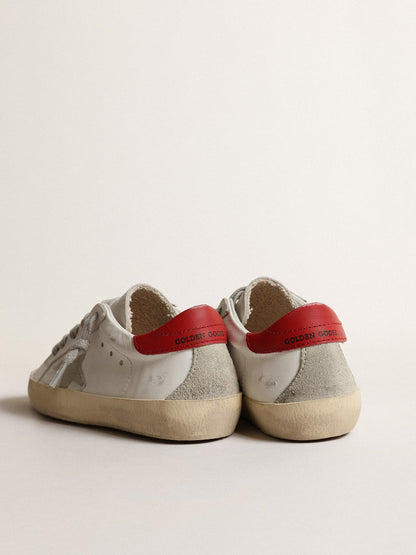 Super-Star Young with suede star and red leather on the heel