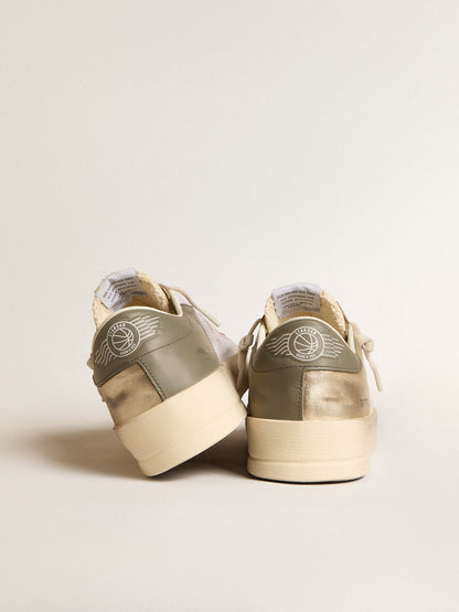 Stardan in white mesh with orange star and platinum leather details