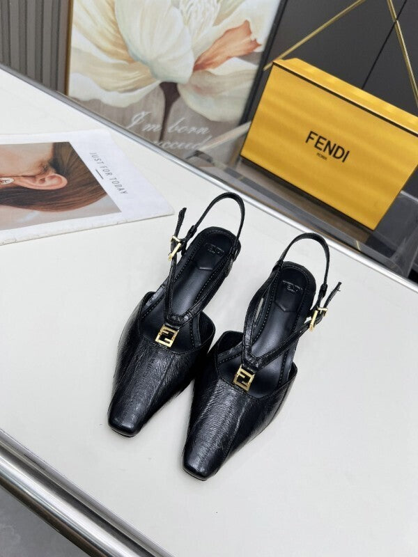 Black leather kitten-heel pumps with gold FF buckles