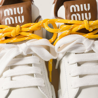 Sneakers aus Leder in Weiß/Braun