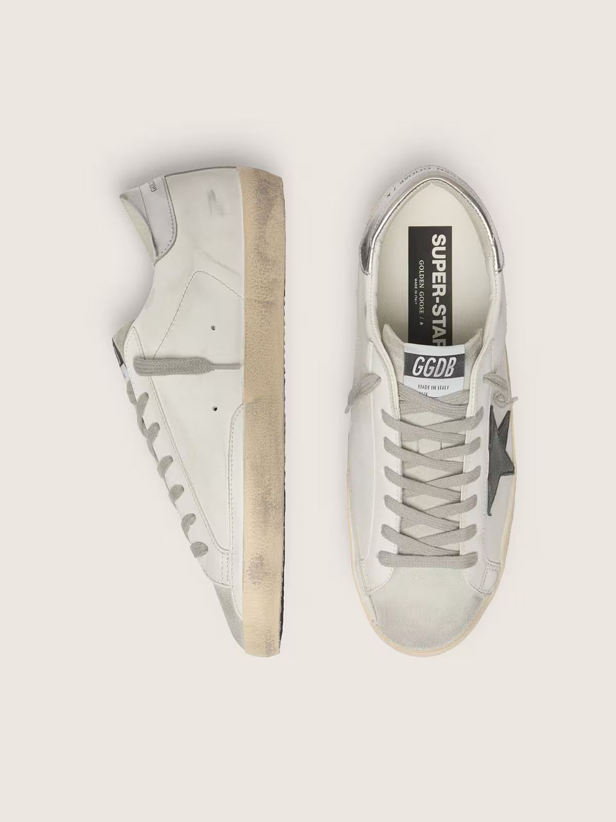White leather with a black nubuck leather star and silver metallic leather heel