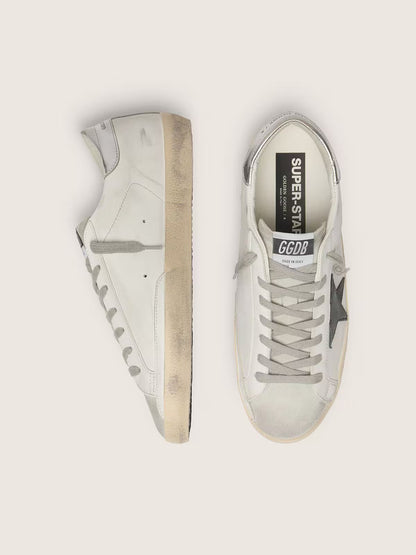 White leather with a black nubuck leather star and silver metallic leather heel