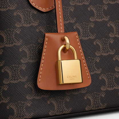 Honorine Teen Tasche aus Triomphe-Canvas und Kalbsleder in Cognac