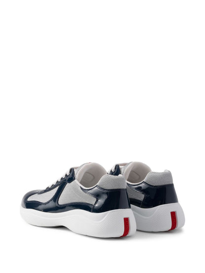 Sneakers with America's Cup inserts
