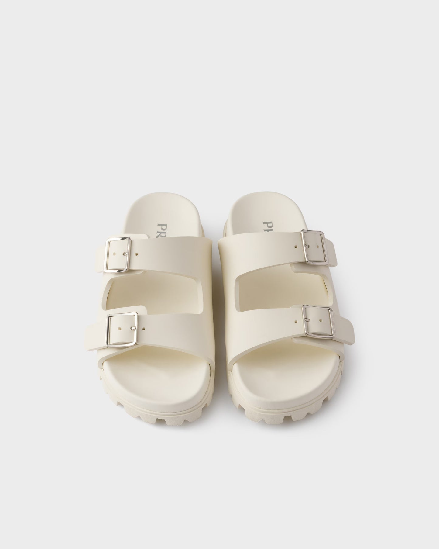 Slider-Sandalen aus elfenbeinfarbenem Gummi