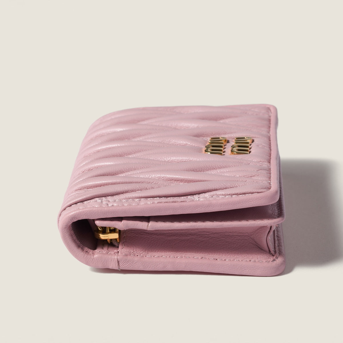 Kleines Portemonnaie aus matelassiertem Nappaleder in Rosa