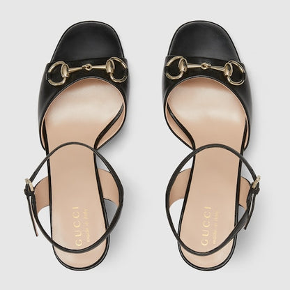 Women's black leather heeled sandals with Morsetto detail