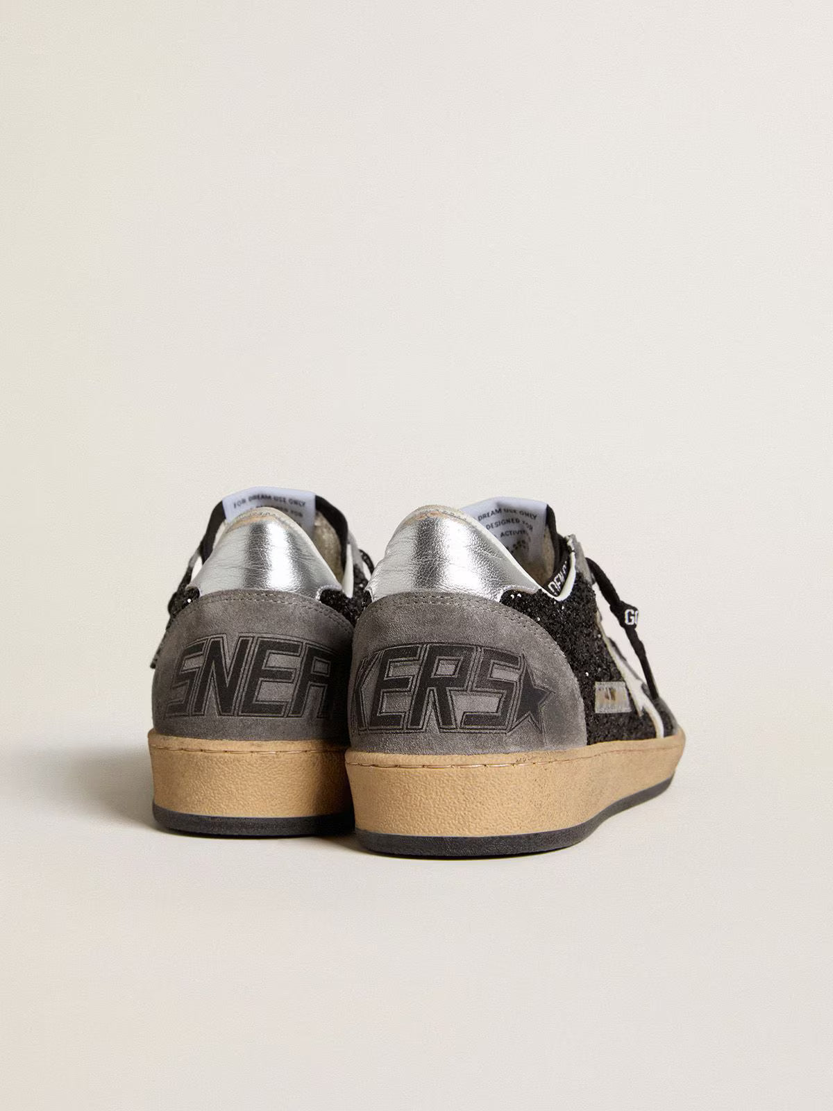 Glitter with leather star and metallic leather on the heel