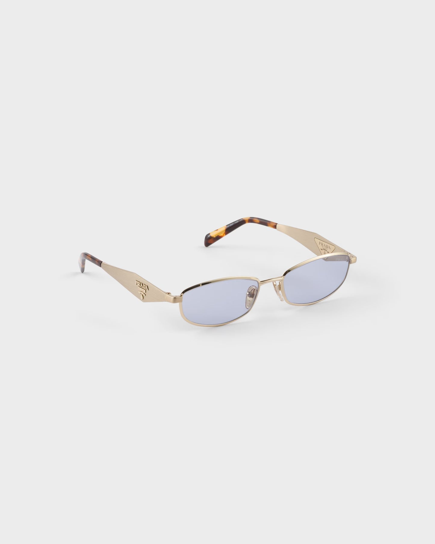 Pale gold acetate oval sunglasses with ultraviolet lenses