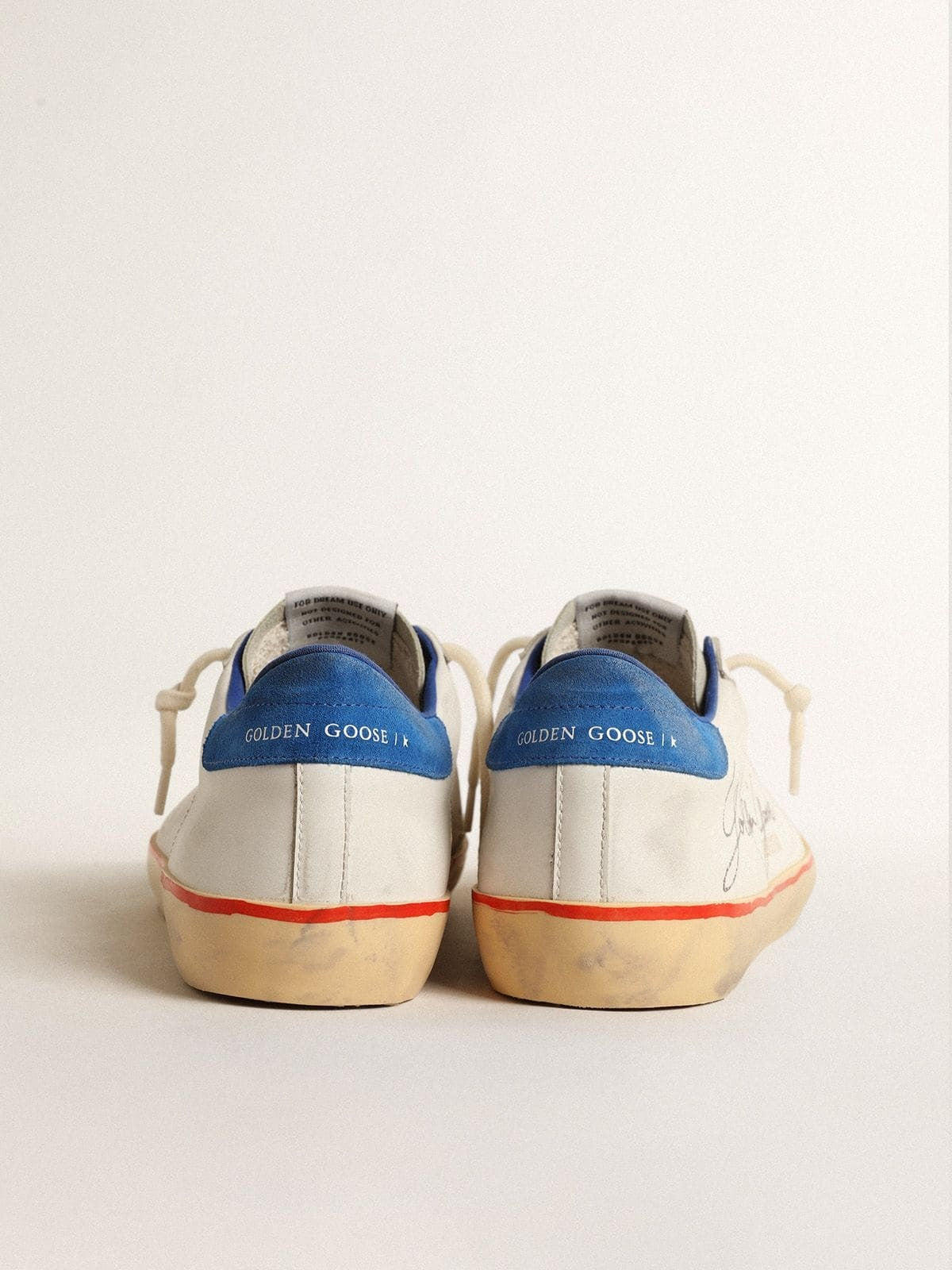 Superstar with perforated star and blue suede heel tab