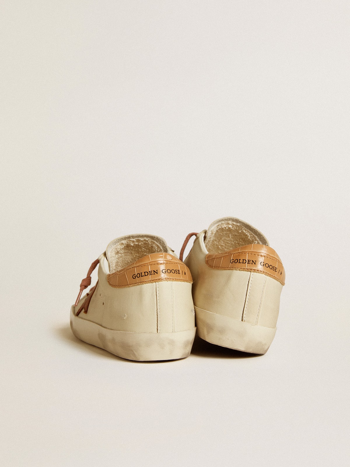 Super-Star with leather star and leather with crocodile print on the heel