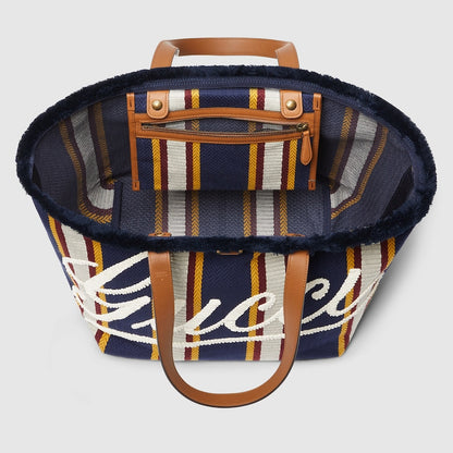 Shopper bag made of embroidered dark blue fabric, medium