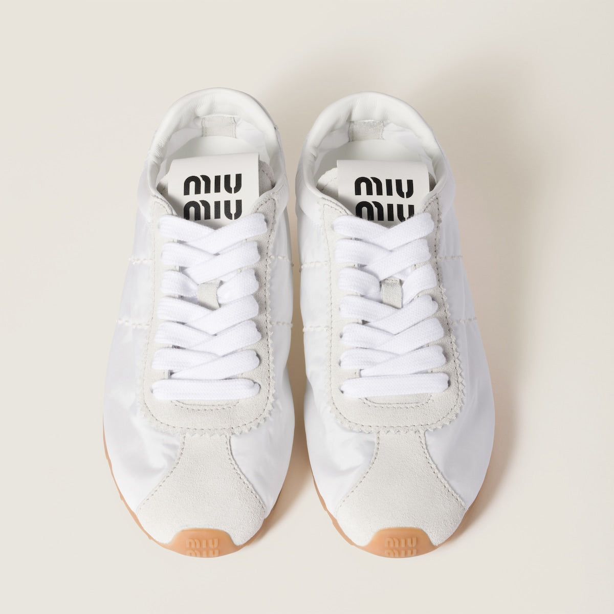 Plume sneakers in white, made from technical fabric and suede