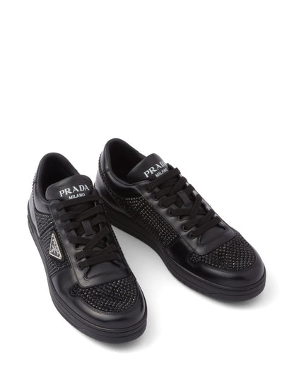Black leather sneakers with crystal details