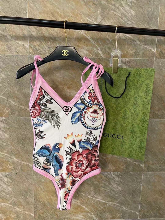 Einteiliger Badeanzug mit Blumen-Vogel-Druck Weiß/Pink