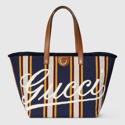 Shopper bag made of embroidered dark blue fabric, medium