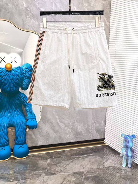Weiße Badehose mit Reiter- und Monogramm-Detail