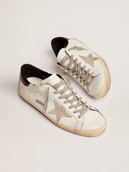 Super-Star with black heel and metal stud lettering