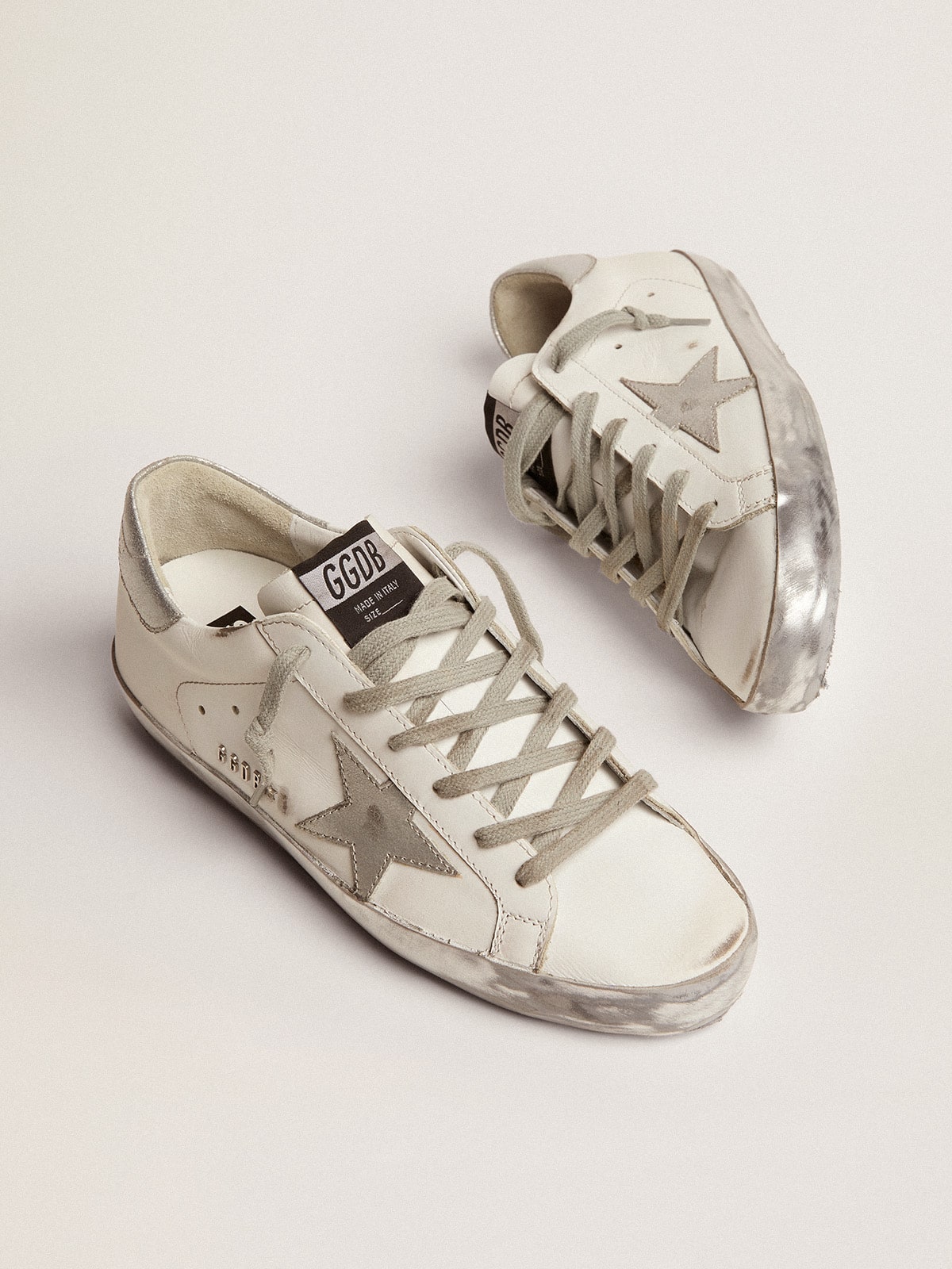 Super-Star with silver-sparkling foxing and metal rivet lettering