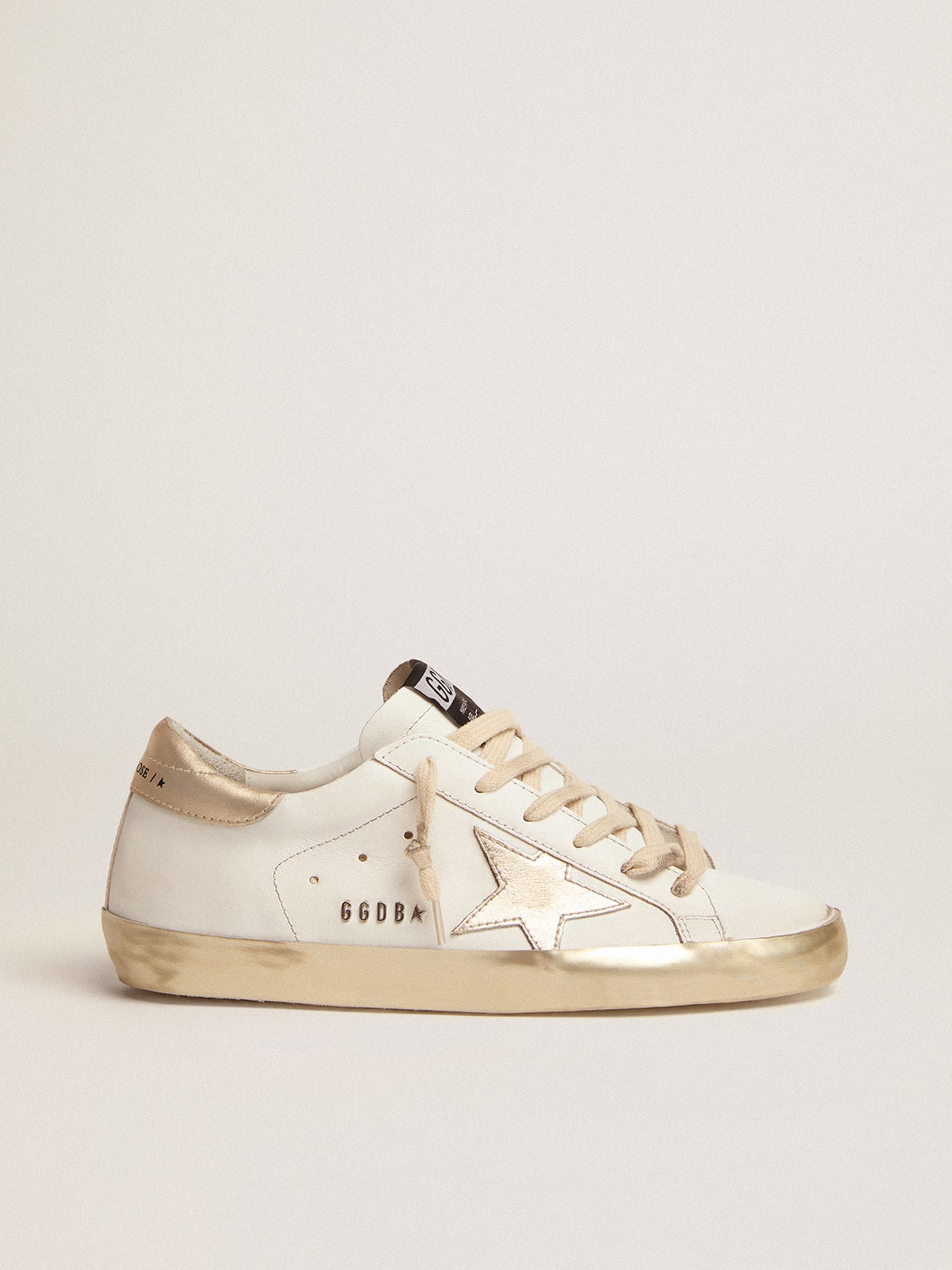 Super-Star with gold-sparkling foxing and metal rivet lettering