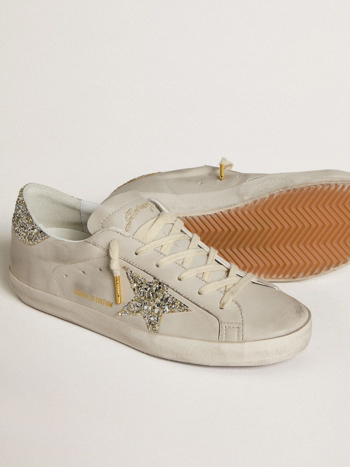 Super-Star LTD in ivory nappa with star and heel in platinum glitter