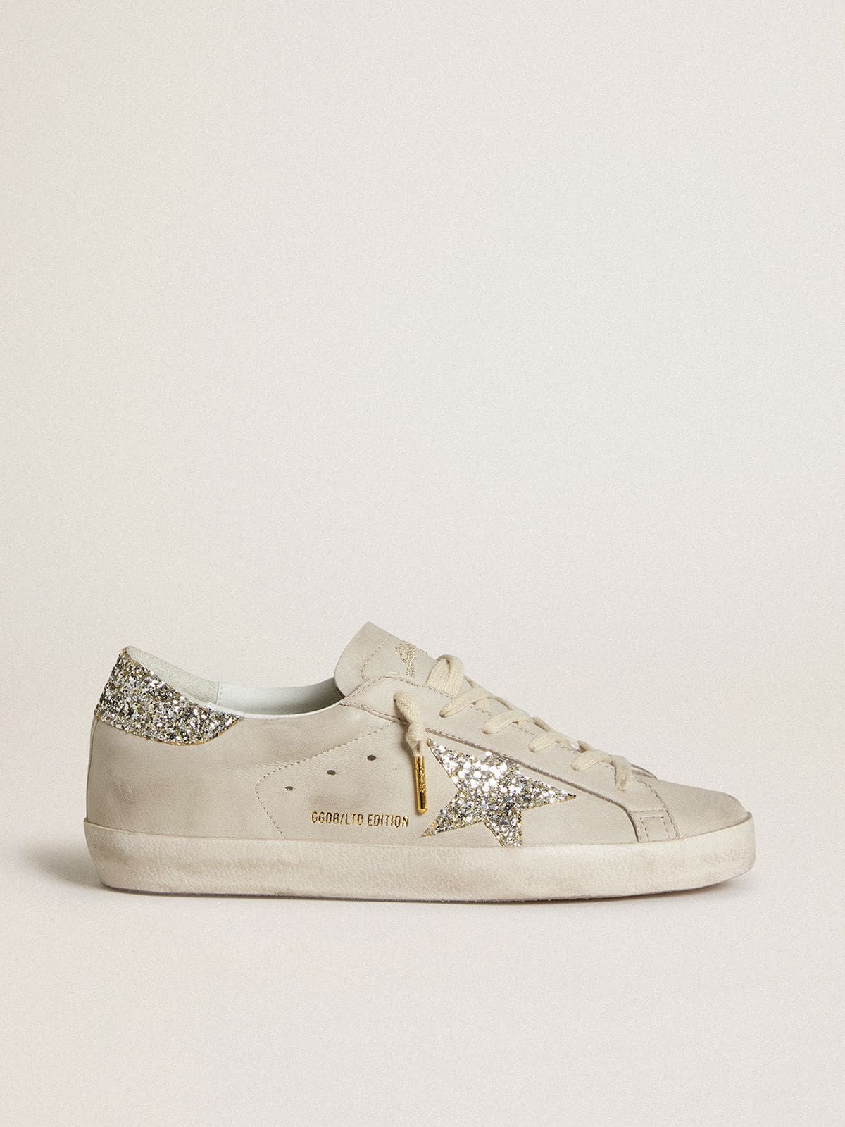 Super-Star LTD in ivory nappa with star and heel in platinum glitter