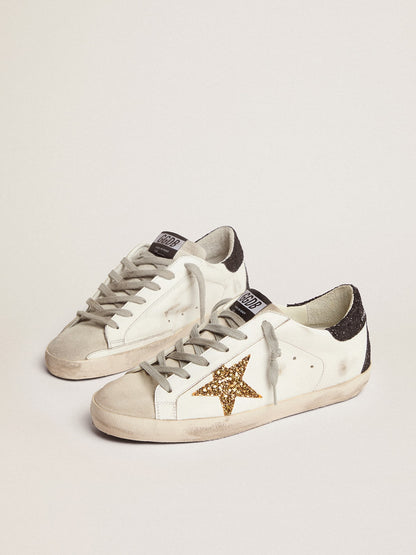 Super-Star made of nappa with a gold glitter star and black glitter on the heel