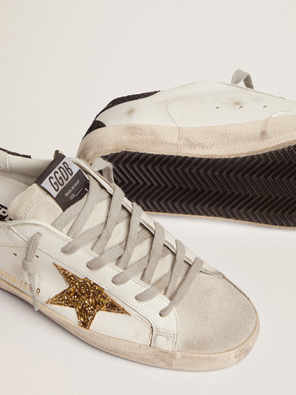 Super-Star made of nappa with a gold glitter star and black glitter on the heel