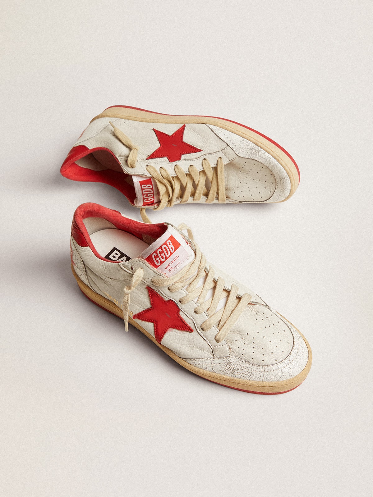 White leather with star and heel in red