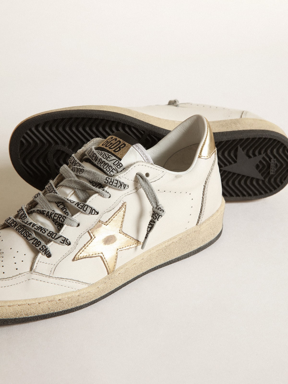 Star and heel in gold