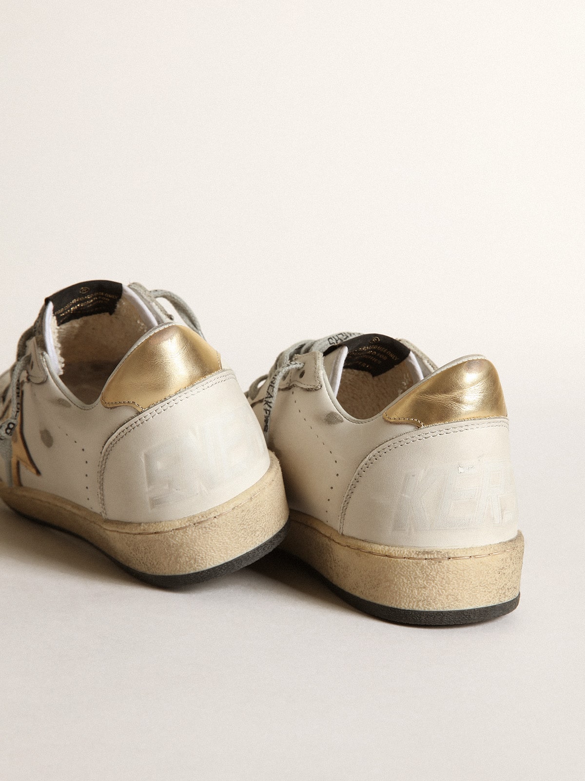Star and heel in gold